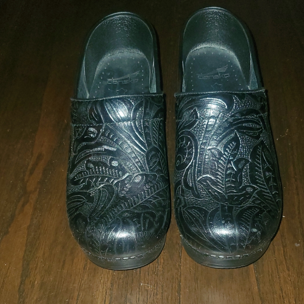 Dansko Black Embossed Leaf Pattern Clogs - image 1